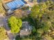Aerial view of the home with hardscaped backyard, close to tennis courts at 1001 Manchester Dr, Raleigh, NC 27609