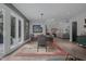 Dining room with hardwood floors, natural light and access to the back patio at 1001 Manchester Dr, Raleigh, NC 27609
