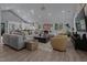 Spacious living room featuring hardwood floors, modern decor, and abundant natural light at 1001 Manchester Dr, Raleigh, NC 27609