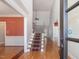 Spacious foyer with hardwood floors, staircase, and high ceilings at 1008 Maduro Ct, Zebulon, NC 27597