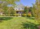 Beautiful two-story home with a brick and siding exterior and lush green lawn at 1008 Maduro Ct, Zebulon, NC 27597