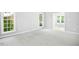 Spacious bedroom featuring carpet and natural light at 102 Cockleshell Ct, Cary, NC 27513
