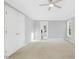 Bright bedroom with carpet, closet, and view of the yard at 102 Cockleshell Ct, Cary, NC 27513