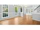 Bright and airy living room featuring hardwood floors and neutral decor at 102 Cockleshell Ct, Cary, NC 27513