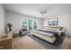 Bedroom features a sleek bed, stylish furnishings, and natural light from the windows at 1020 Sycaten St, Durham, NC 27703