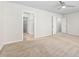 Bedroom with carpet and multiple doors leading to a closet and other rooms at 1020 Sycaten St, Durham, NC 27703