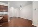 Open-concept living room with wood floors and access to the kitchen, perfect for entertaining at 1020 Sycaten St, Durham, NC 27703