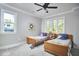 Charming bedroom with twin beds, plush decor, and a bright, airy atmosphere perfect for or guests at 107 Hillcrest Ave # C And D, Carrboro, NC 27510