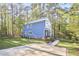 Exterior of a home surrounded by mature trees with a driveway at 107 Hillcrest Ave # C And D, Carrboro, NC 27510