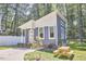 Front exterior view of a modern, compact home, showcasing the entrance, picnic table, and well-manicured lawn at 107 Hillcrest Ave # C And D, Carrboro, NC 27510