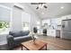 Spacious open-concept living area seamlessly blends a modern kitchen with a comfortable living space at 107 Hillcrest Ave # C And D, Carrboro, NC 27510