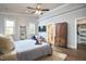 Spacious bedroom with sitting area, walk-in closet, ensuite bath, and a king bed, filled with natural light at 107 Hillcrest Ave # C And D, Carrboro, NC 27510