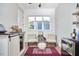 A sitting room features a record player, comfortable seating, a patterned rug and natural light at 107 Hillcrest Ave # C And D, Carrboro, NC 27510