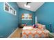 Stylish main bedroom with vaulted ceiling, skylight, sitting area, and a large window at 1109 Huntington Ave, Durham, NC 27707