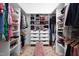 Spacious walk-in closet with custom shelving and ample storage at 1109 Huntington Ave, Durham, NC 27707