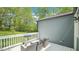 Backyard deck with outdoor seating and grill, perfect for relaxation or entertaining guests at 111 Dunstan Ave, Durham, NC 27707