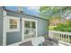 Deck with outdoor seating and a clear view of the outdoors, accessible through glass sliding doors at 111 Dunstan Ave, Durham, NC 27707