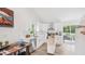 Modern kitchen with white cabinets, stainless steel appliances, and hardwood floors at 111 Dunstan Ave, Durham, NC 27707