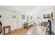 Bright living room with hardwood floors, neutral decor, and ample natural light at 111 Dunstan Ave, Durham, NC 27707