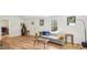 Cozy living room with hardwood floors, a comfortable sofa, and stylish decor at 111 Dunstan Ave, Durham, NC 27707