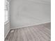 Bright bedroom featuring neutral walls and hard surface flooring at 1120 Shetland Ct, Raleigh, NC 27609