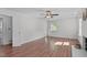 Spacious bedroom with wood floors, a fireplace, and a ceiling fan at 1120 Shetland Ct, Raleigh, NC 27609