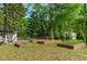 Backyard garden featuring multiple raised beds for planting vegetables, herbs, and flowers at 1120 Shetland Ct, Raleigh, NC 27609