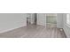 Spacious room featuring neutral walls and hard surface flooring at 1120 Shetland Ct, Raleigh, NC 27609