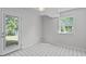 Mud room with black and white floor tiles and access to the backyard at 1120 Shetland Ct, Raleigh, NC 27609