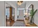 Elegant foyer with chandelier, mirror, and an open view to other rooms at 119 Wolf Creek Dr, Wendell, NC 27591
