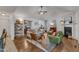 Spacious living room with fireplace, hardwood floors, and lots of natural light at 119 Wolf Creek Dr, Wendell, NC 27591