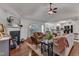 Comfortable living room with a fireplace that opens to the kitchen and dining at 119 Wolf Creek Dr, Wendell, NC 27591