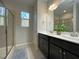 Bathroom featuring glass shower, and double vanity at 120 Putters Ct, Durham, NC 27703
