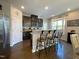 Kitchen with stainless steel appliances, granite countertops, and seating at the bar at 120 Putters Ct, Durham, NC 27703