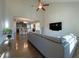 Bright living room featuring vaulted ceilings, modern furnishings, and an open layout to the dining area at 120 Putters Ct, Durham, NC 27703