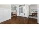 Spacious foyer with hardwood floors transitioning to a dining room and office space for versatile living at 1203 Great Egret Way, Durham, NC 27713