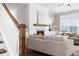 Comfortable living room boasts a modern fireplace, plush seating, and plenty of natural light at 1203 Great Egret Way, Durham, NC 27713