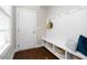 Welcoming mudroom provides a built-in bench with storage, perfect for organizing and keeping your home tidy at 1203 Great Egret Way, Durham, NC 27713
