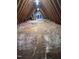 Unfinished attic space with wooden beams and insulation, great for storage or future expansion at 1208 Goodwin Rd, Apex, NC 27523
