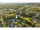 Sprawling community features lush trees and a beautiful pond at 1216 Caribou Xing, Durham, NC 27713