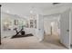 Open exercise room with peloton bike, storage, and built-in shelving at 1216 Caribou Xing, Durham, NC 27713