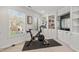Bright exercise room with large window and built-in shelving at 1216 Caribou Xing, Durham, NC 27713
