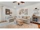 Comfortable living room with neutral decor and wood floors offers a relaxing space for entertaining at 1216 Caribou Xing, Durham, NC 27713