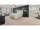 Spacious main bedroom featuring a comfortable sitting area and exercise equipment at 1216 Caribou Xing, Durham, NC 27713