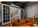 Office featuring a decorative desk and french doors that open to the foyer at 1216 Caribou Xing, Durham, NC 27713