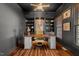 Spacious office with custom built-in shelves and a comfortable swivel chair at 1216 Caribou Xing, Durham, NC 27713