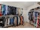 Large walk-in closet with ample hanging space and shelving at 1216 Caribou Xing, Durham, NC 27713