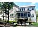 A well-maintained backyard featuring a screened porch, outdoor seating and hammock that creates a relaxing atmosphere at 127 Sanderway Dr, Chapel Hill, NC 27516