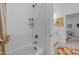The modern bathroom features a white tiled shower with a bathtub at 127 Sanderway Dr, Chapel Hill, NC 27516
