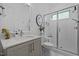 Bathroom featuring a modern vanity, glass-enclosed shower, and stylish decor at 127 Sanderway Dr, Chapel Hill, NC 27516